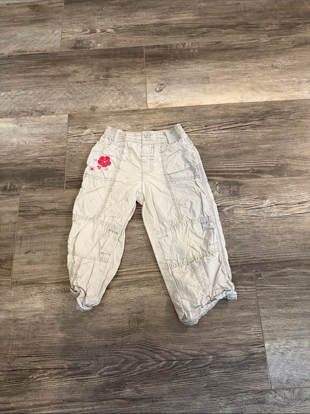 Roots Kids Cream Cargo Jogger Pants with Pink Flower Accent